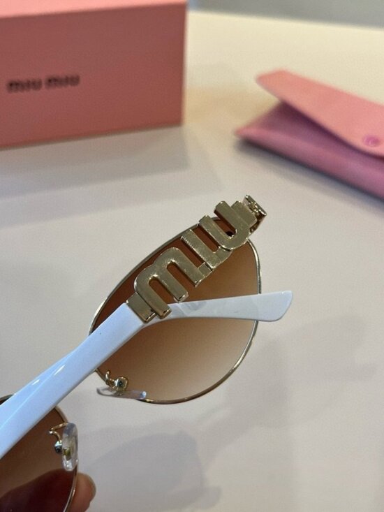 Miu Miu Cat-Eye Glasses with White Frames and Brown Lenses main image 5